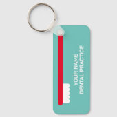 Tandarts kantoor sleutelhanger met rode tandenbors (Voorkant)