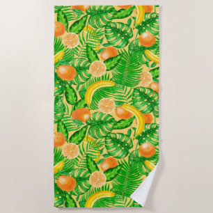 Tangerines, bananen en tropische bladeren strandlaken