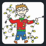 Tangled Christmas Lights Stickers<br><div class="desc">Deze Tangled Christmas Lights-stickers begrijpen dat die zalen zichzelf niet dekken. Het ontwerp is voorzien van een handgetekende stokfiguur man, met een rode en groene trui met coltrui en een verstrengelde streng van gele lichten. De uitdrukking op zijn gezicht zegt alles. Oh, wat een verwarde lampjes strengen we! Deze stickers...</div>