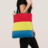 Tas met blauwe, gele en rode strepen (Dichtbij)