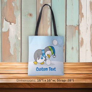 Tas met kleine pinguïn die op sneeuw loopt