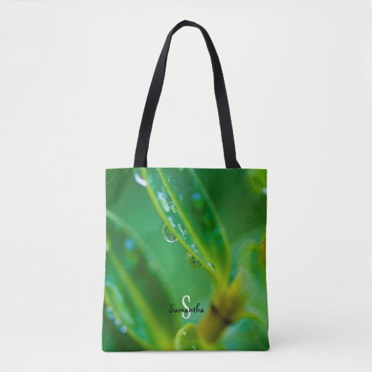 Tas met regendruppels op groene bladeren (Voorkant)