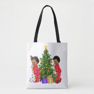 Tas voor Kerstmis met Afrikaanse Amerikaanse kinde