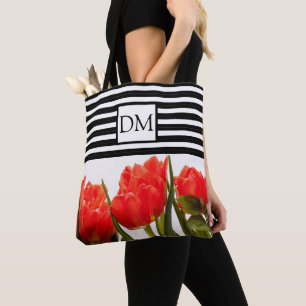 Tassen met rode tulpen en zwarte strepen en monogr