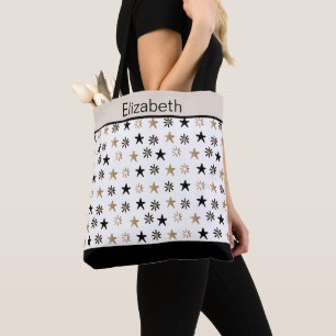 Tassen met zwarte gouden sterren en monogram