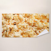 Tasty popcorn op de hele achtergrond. Eten Badhanddoek (Badhanddoek)