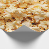 Tasty popcorn op de hele achtergrond. Eten  Cadeaupapier (Hoek)