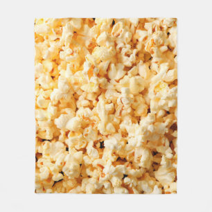 Tasty popcorn op de hele achtergrond. Eten Fleece Deken
