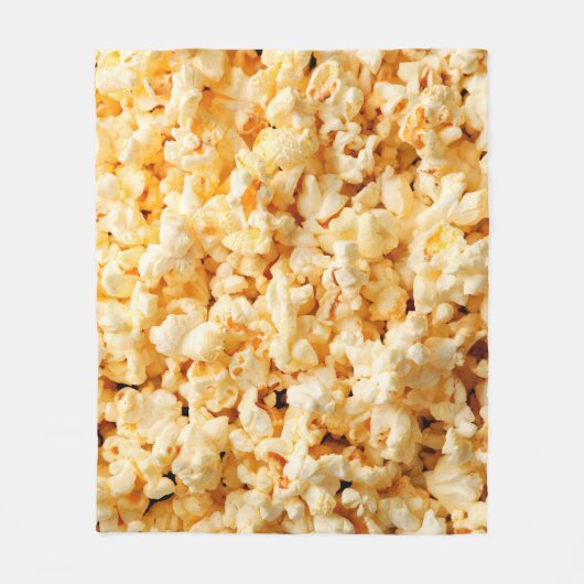 Tasty popcorn op de hele achtergrond. Eten  Fleece Deken (Voorkant)