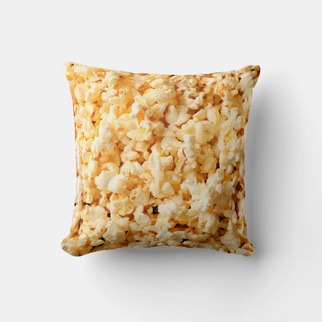 Tasty popcorn op de hele achtergrond. Eten  Kussen (Voorkant)