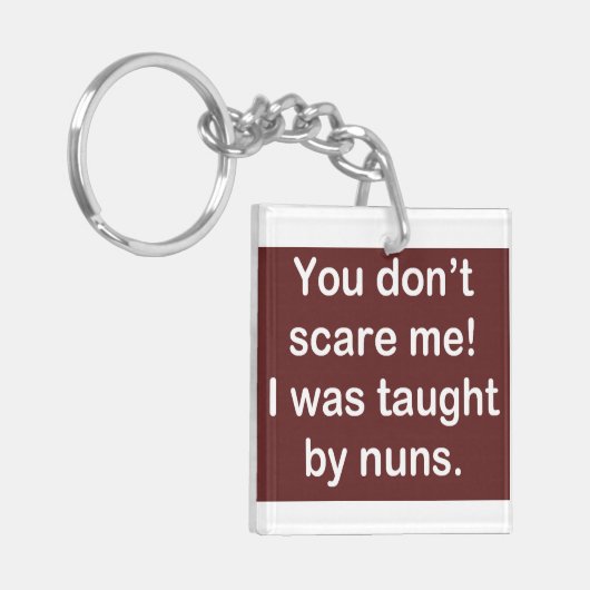 Taught by Nuns in Dark Sleutelhanger (Voorkant Links)