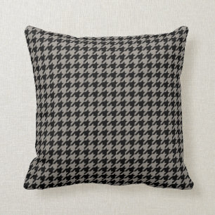 Taupe-kleurendrondevormig patroon met kussen