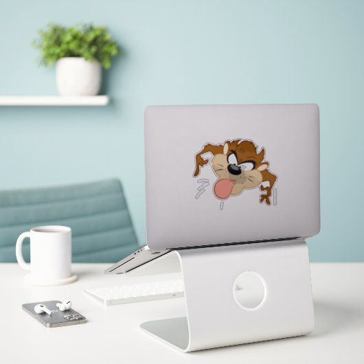 TAZ™ Tongue uit Sticker (Laptop op bureau)