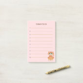 Te doen dingen en keukenkat met tabby post-it® notes (Op bureau)