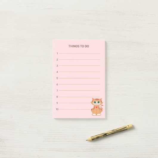 Te doen dingen en keukenkat met tabby post-it® notes (Op bureau)