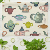 Tea potten in een  theekdoek theedoek (Gevouwen)