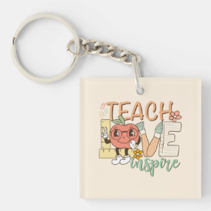 Teach Love Inspire – Schattigee schoolbenodigdhede Sleutelhanger