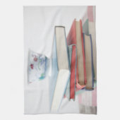 Teacup op boekstapel theedoek (Verticaal)