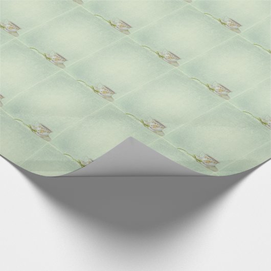  teacup op groene textuurachtergrond cadeaupapier (Hoek)