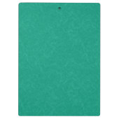 Teal gestructureerd oppervlak met subtiel draaiend klembord (Achterkant)