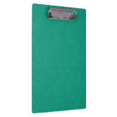 Teal gestructureerd oppervlak met subtiel draaiend klembord (Rechts)