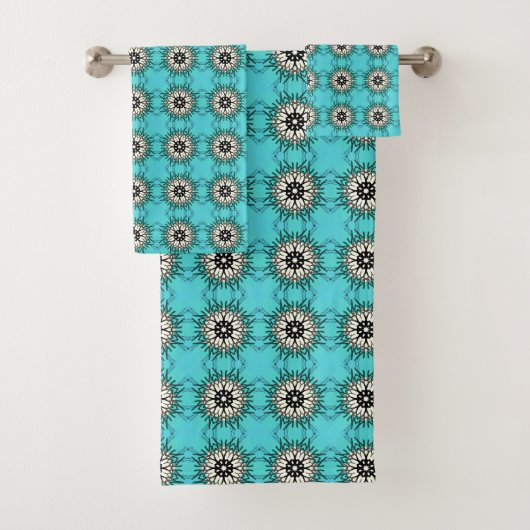  teal towels featuring a black and white geometric bad handdoek (Insitu)