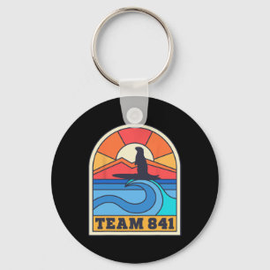 Team 841 Otter Surft op Californië Strand Grappig Sleutelhanger