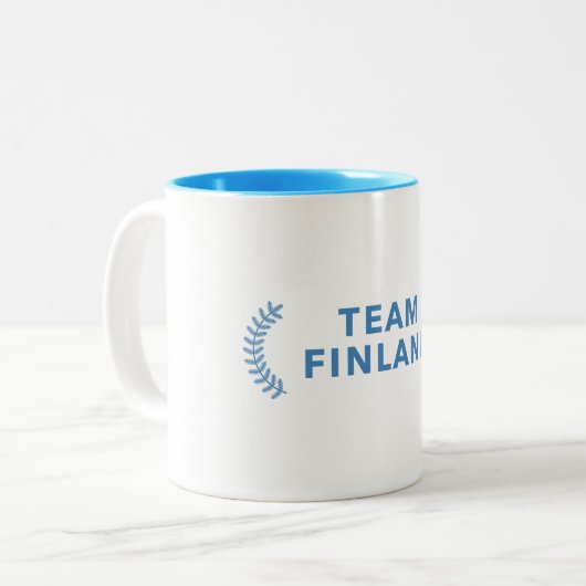 Team Finland Tweekleurige Koffiemok (Voorkant links)