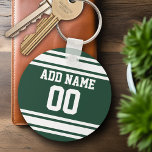 Team Jersey met de Naam en het Aantal van de Douan Sleutelhanger<br><div class="desc">Groene en Witte kleuren — Als je een team van Fantasy Football bent,  maak je eigen producten en show af aan je vrienden! Of - Speel je Football op de middelbare school en wil je een memento? Deze trui is perfect voor iedereen die sporten speelt.</div>