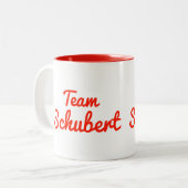 Team Schubert Tweekleurige Koffiemok (Voorkant links)