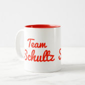 Team Schultz Tweekleurige Koffiemok (Voorkant links)