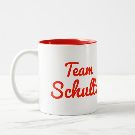 Team Schultz Tweekleurige Koffiemok (Links)