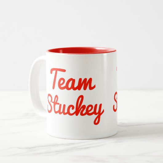 Team Stuckey Tweekleurige Koffiemok (Voorkant links)