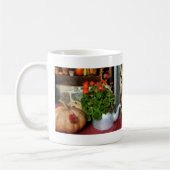 Teapot gevuld met geraniums koffiemok (Links)