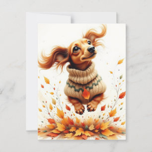 Teckel die in de herfstbladeren speelt briefkaart