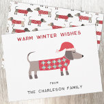 Teckel Hond in een Santa Hat Fun Feestdagenkaart<br><div class="desc">Schattigee en schattige Dachshund Worst of Wiener hond in een feestelijke rode en witte gebreide trui. Wijzig de namen en de begroeting om te personaliseren. Originele kunst van Nic Squirrell.</div>