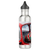 teckel hond op een auto, en de feestdagen waterfles  (Links)