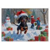 Teckel loopt in de sneeuw met kerst Pet Snijplank (Voorkant)