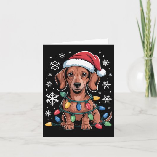 Teckel met kerstmuts verpakt in kerstverlichting kaart (Voorkant)