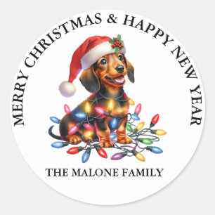 teckel Santa Paws komt naar de stad Ronde Sticker