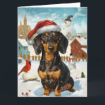Teckel Winter Wonderland Christmas Joy Kaart<br><div class="desc">Dit feestelijke ontwerp vangt de vrolijke sfeer van het vakantieseizoen, met een schattige pup die een kerstmuts draagt. De hond is genesteld in een winterwonderland, compleet met een sneeuwpop, een versierde kerstboom en prachtig ingepakte cadeaus. Sneeuwvlokken herfsten zachtjes en voegen een magische toets toe aan het tafereel, terwijl de levendige...</div>