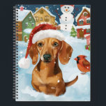 Teckel Winter Wonderland Christmas Joy Notitieboek<br><div class="desc">Dit feestelijke ontwerp vangt de vrolijke sfeer van het vakantieseizoen, met een schattige pup die een kerstmuts draagt. De hond is genesteld in een winterwonderland, compleet met een sneeuwpop, een versierde kerstboom en prachtig ingepakte cadeaus. Sneeuwvlokken herfsten zachtjes en voegen een magische toets toe aan het tafereel, terwijl de levendige...</div>