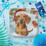 Teckel Winter Wonderland Christmas Joy Papieren Bordje<br><div class="desc">Dit feestelijke ontwerp vangt de vrolijke sfeer van het vakantieseizoen, met een schattige pup die een kerstmuts draagt. De hond is genesteld in een winterwonderland, compleet met een sneeuwpop, een versierde kerstboom en prachtig ingepakte cadeaus. Sneeuwvlokken herfsten zachtjes en voegen een magische toets toe aan het tafereel, terwijl de levendige...</div>