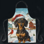 Teckel Winter Wonderland Christmas Joy Schort<br><div class="desc">Dit feestelijke ontwerp vangt de vrolijke sfeer van het vakantieseizoen, met een schattige pup die een kerstmuts draagt. De hond is genesteld in een winterwonderland, compleet met een sneeuwpop, een versierde kerstboom en prachtig ingepakte cadeaus. Sneeuwvlokken herfsten zachtjes en voegen een magische toets toe aan het tafereel, terwijl de levendige...</div>