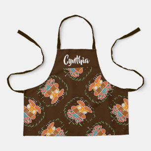 Teddy beer en vlinder op bruin schort