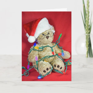 Teddy-beer in kerstverlichting feestdagen kaart