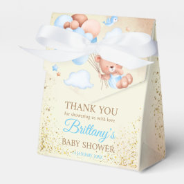 Teddy beer met bruine en blauwe ballonnen en wolke bedankdoosjes