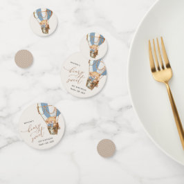 Teddybeer, blauwe heteluchtballon, eerste verjaard confetti