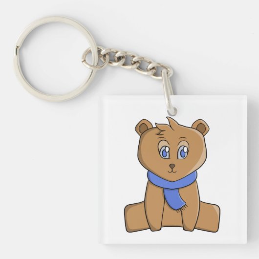 Teddybeer draagt een blauwe sjaal sleutelhanger (voorkant)
