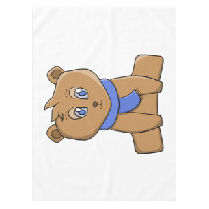 Teddybeer draagt een blauwe sjaal tafelkleed